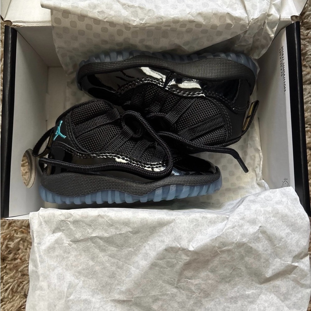 Jordan 11 Retro Black and Blue Sneakers